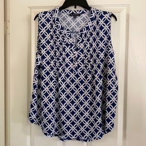 Royal blue, black and white sleeveless blouse